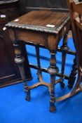 An early 20th Century mahogany plant stand