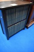 An early 20th Century stained frame low bookshelf containing set of Encyclopedia Brittannica (14th