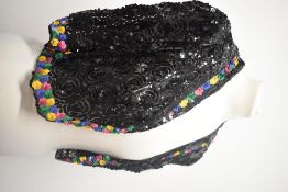 A 1930s Art Deco French sequinned bolero, using yellow, pink , blue and green sequins to edge and