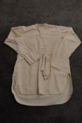A 1940s CC41 labelled cream gents collarless shirt, with four collars to be included.