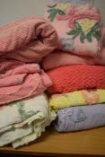Eight mid century candlewick bed covers, in a variety of colours and sizes.