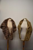 Two vintage faux fur wraps.