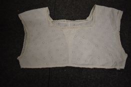 Five Victorian corset covers/ camisoles, all having intricate details, various sizes.