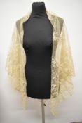 A fine mid Victorian tulle with hand applied lace shawl.