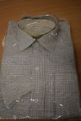 A gents 1950s checked Radiac collarless shirt, as new in packaging, with two collars, collar size
