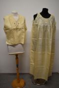A beautifully embroidered 1930s blouse, having ladder work and floral decoration to front, and a