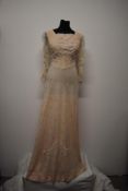 A pale tea coloured Edwardian dress of shot cotton, or blended shot cotton with large dot pattern,