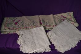Three vintage and antique tablecloths, including 1930s embroidered example.