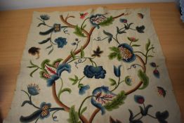 A section of antique crewel work.