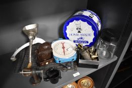A collection of kitchenalia, including piping set, mincer and scales.