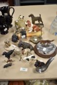 A selection of various canine related items, including cold-painted figures, ashtrays, match book