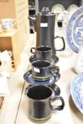 An attractive vintage ten piece studio pottery coffee set, in the manner or influenced by Denby