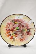 A Limoges enamelled bowl, by J.Betourne, having a multi-coloured radiating design, with a diameter