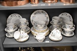 A quantity of Colclough china tableware decorated with foliage