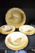 A selection of Royal Doulton bowls, having various count4ry cottage designs to centres.