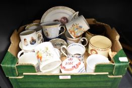 A carton of mainly coronation ware ceramics.