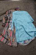 A mixed lot of vintage clothing, to include 1960s skirt suit, 1970s floral dress, 1970s paisley