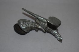 A Louis Lejeune white metal pheasant car mascot, the underside stamped with maker's mark, and