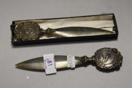 Two Victorian bronze handled Leopard Shirtings letter openers, both 16cm long