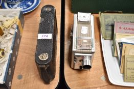 A Kodak Brownie 8mm movie camera and a Kodak No 1A Jr.