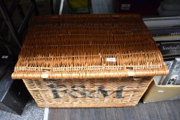 A Fortnum and Mason wicker hamper.