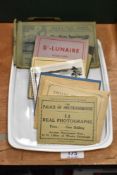A selection of booklets of vintage postcards, including London, Holyroodhouse, Windsor etc.