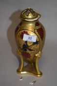 A French Beaux d'Art Limoges lidded vase, of ovoid form, gilt coloured, and decorated with birds and