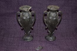 A pair of 19th Century Art Nouveau spelter twin handled vases of small proportions, measuring 19cm
