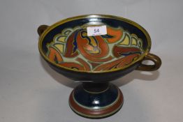 A Dutch Gouda twin handled pottery tazza measuring 13cm tall