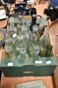 A collection of vintage advertising bottles, including St Annes, Bolton and Lancaster interest.