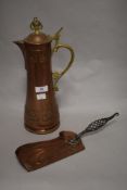 A 19th Century copper and brass lidded ewer, of Art Nouveau design, the body decorated with a