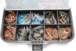 A pocket box containing approx 160 fly's mixed montana's Peter Ross, Jenny Ross, teal and red,