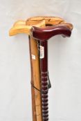 A selection of six wooden walking sticks with wooden handles Average length is 90cm