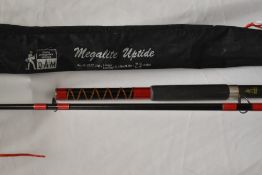 A DAM megalite uptide 9.5ft 6-8oz 2 pc rod in original soft sleeve