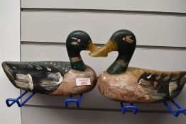 A brace of vintage wooden decoy ducks (slight pellet marks)