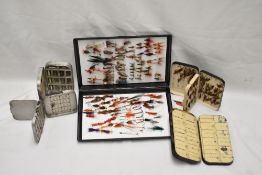 A selection of 5 fly fishing boxes and contents of both trout and salmon flies the two vintage black