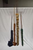 Four vintage fly and spinning rods including Edgar Sealy live fibre