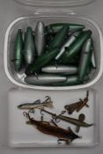A selection of vintage fishing minnows and some hand painted wooden lure bodies