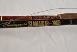 Two Vintage boat fishing rods one unmarked and a Shakespeare seamaster 1406 with a Daiwa Sealine