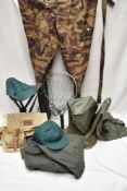 A crate containing 2 sets of waders size 8 & 9 a Shakespeare canvas fishing bag with liner, stool,