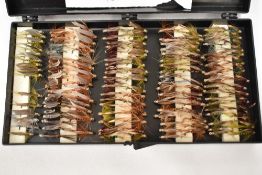 A box of fishing flies containing approximately 150 flies. Winged Quill Flies