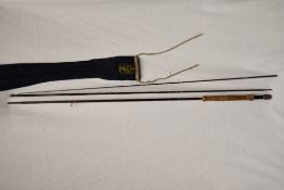 A Hardy graphite de-luxe 3pc #7/8 11ft fly rod in original sleeve