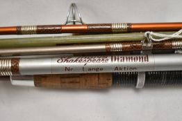 A selection of boat fishing rods & reels and assorted tackle