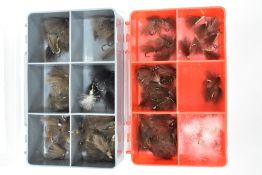 Two pocket boxes of dry fishing flies containing approximately 110. F Flies and CDC flies