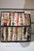 A pocket box containing approx 140 mixed winged Curley bum Nymphs and mixed wing Doubles