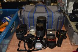 A Nikon F801AF camera body No2438796 with EL-Nokkor 1:2,8 50mm lens, a Sigma UC Zoom-K 1:4-5,6 70-