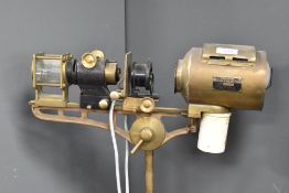 A vintage Flatters & Garnett Ltd, Oxford Rd Manchester projector on a stand AF