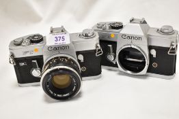 Two Canon FT camera bodies Nos497468 & 513204 one with a Canon FL 1:1,8 50mm lens