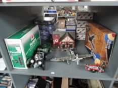A modern Meccano Supermarine Spitfire, made up with original box along with a Golden Wheel Texaco