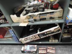 Two shelves of 1990's Scalextric including Formula One part set, 400 part set, Track Support